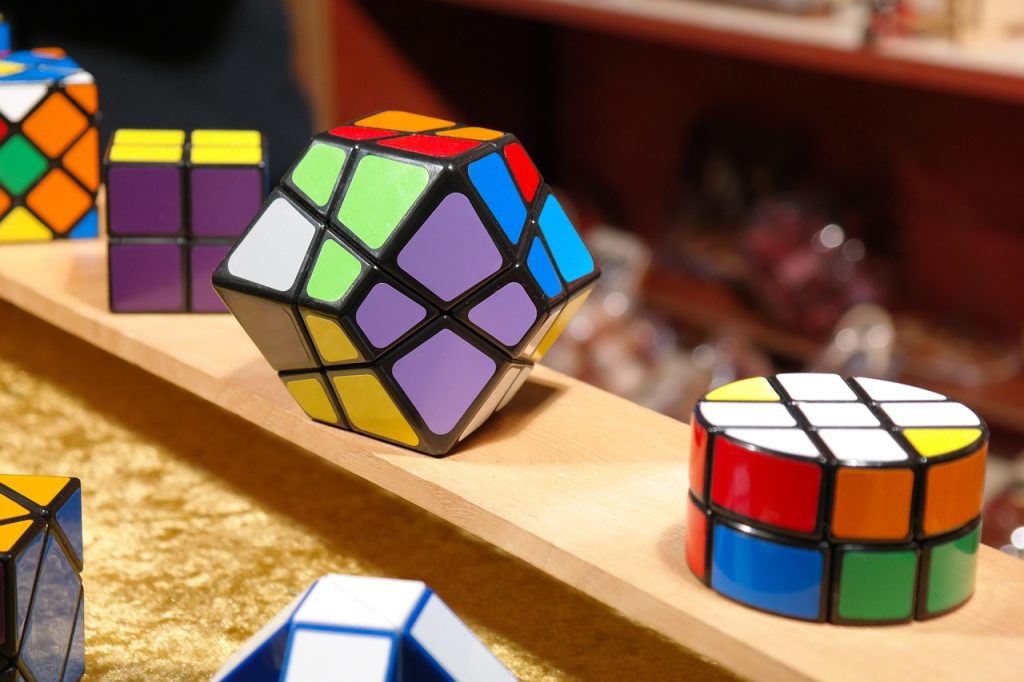 magic cube, patience games, puzzle, tricky, toy, puzzle piece, to play, metal, runaway, difficult, patience, christmas market, market stall, was standing, christmas stand, sales booth, depth of field, magic cube, difficult, difficult, difficult, difficult, difficult